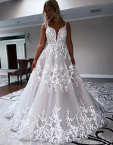A Line Sweep Train Deep V Neck Wedding Dress With Appliques