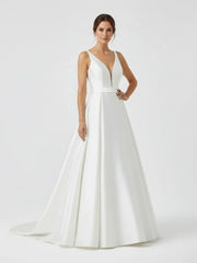 Ivory A Line Deep V Neck Long Wedding Dress with Bowknot