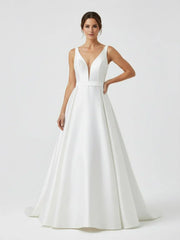 Ivory A Line Deep V Neck Long Wedding Dress with Bowknot