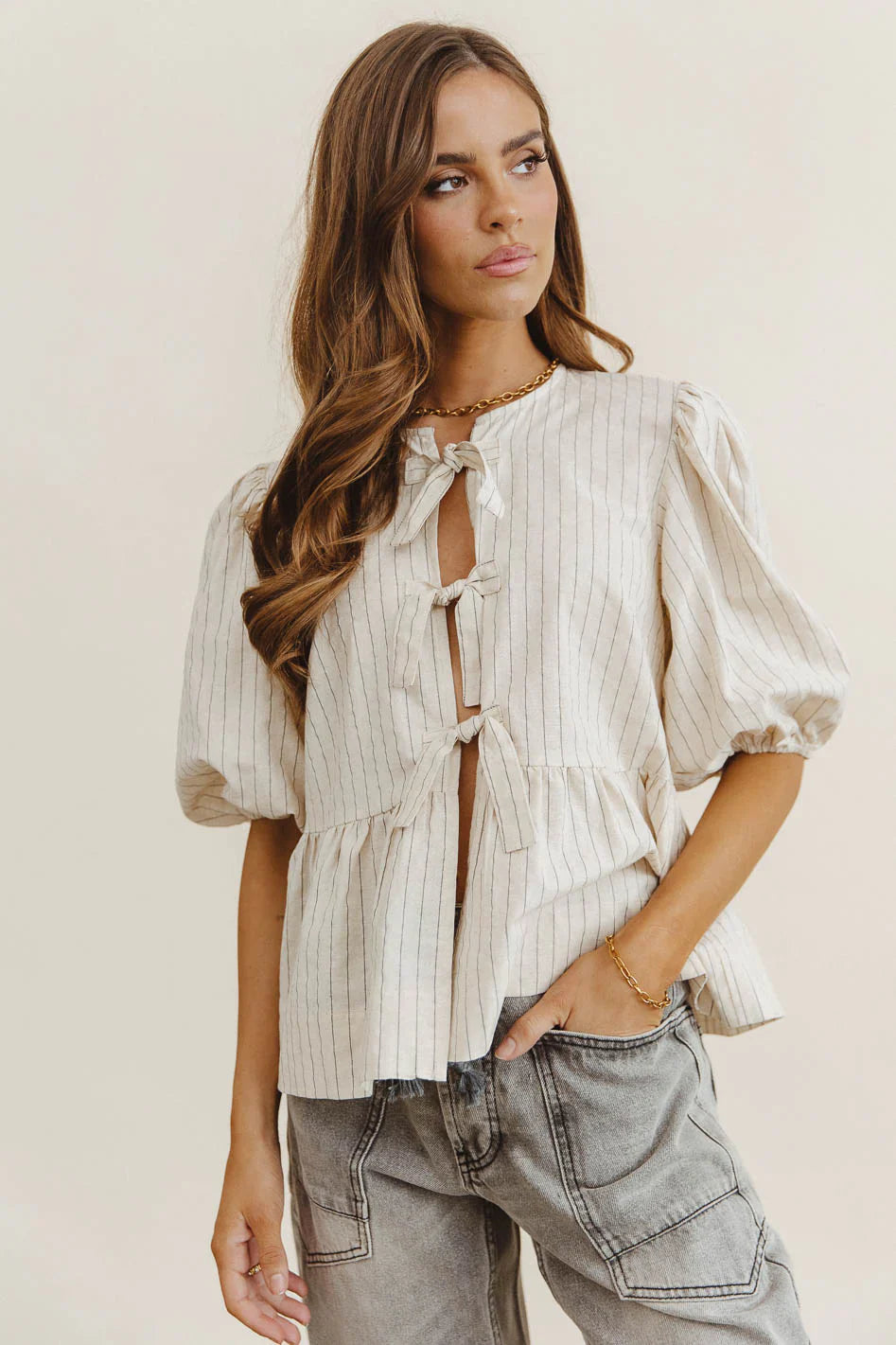 Corey Peplum Top in Tan