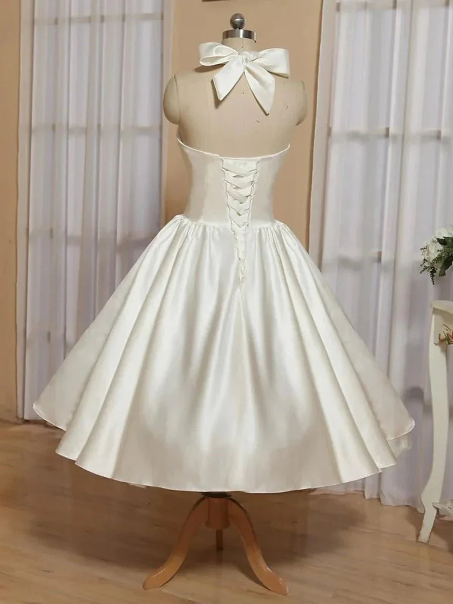 White A Line Halter Sleeveless Tea Length Satin Bridal Gowns With Bows Pleats
