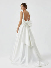 Ivory A Line Deep V Neck Long Wedding Dress with Bowknot