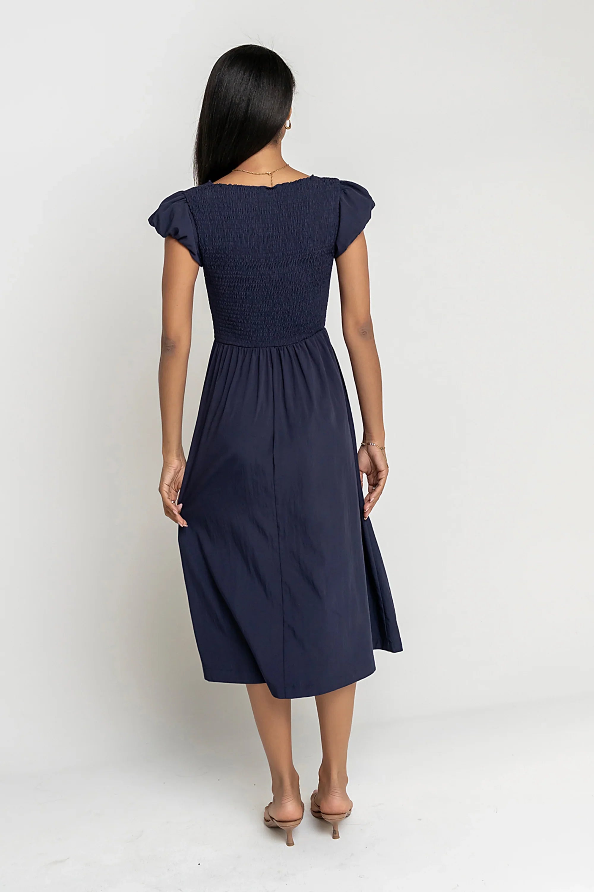 Harshell Smocked Midi Dress